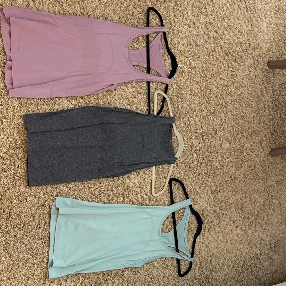 Set of Three lululemon Tank Tops - Pink, Gray, and Mint